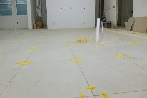 Close-up of professional tile installation in progress