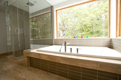 Custom tiled walk-in shower and tub surround completed in a Wasatch County home